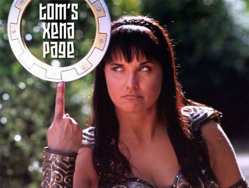 The Tom's Xena Page logo - a bemused Xena holding her chakram with the words, Tom's Xena Page printed inside.